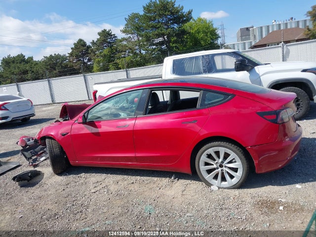 5YJ3E1EA9NF258340 Tesla 2022