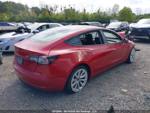 5YJ3E1EA9NF258340 Tesla 2022