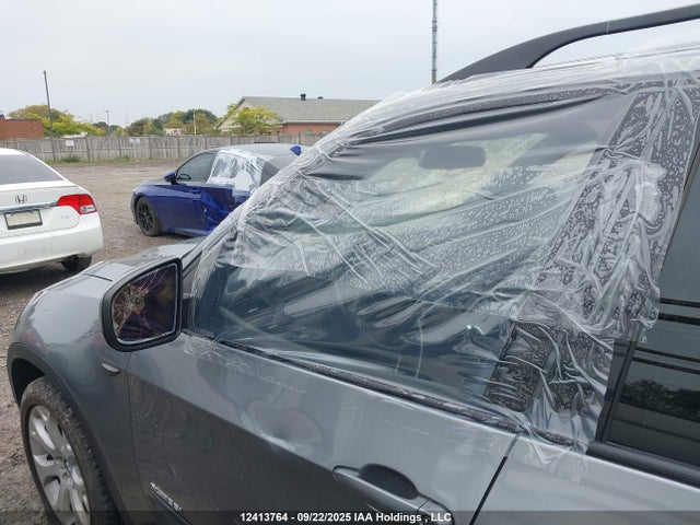 Продаж на аукціоні авто 2011 Bmw X5, vin: 5UXZV4C51BLL58182, номер лоту: 12413764