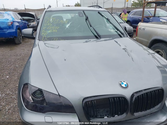 Продаж на аукціоні авто 2011 Bmw X5, vin: 5UXZV4C51BLL58182, номер лоту: 12413764