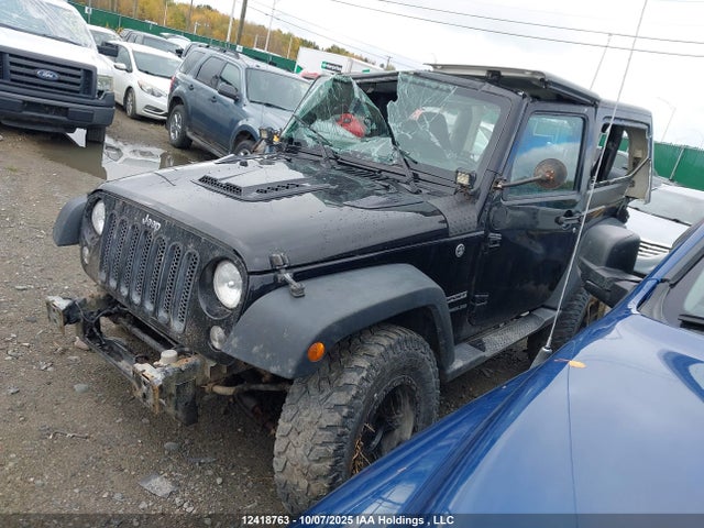 1C4AJWAG2GL327041 Jeep Wrangler Sport