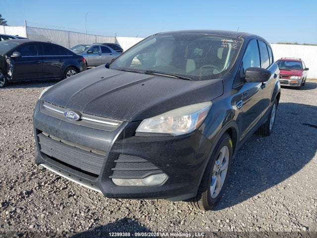 1FMCU9G93EUE02813 Ford 2014