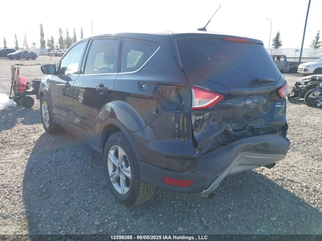 1FMCU9G93EUE02813 Ford 2014