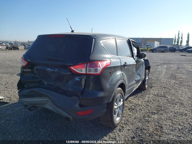 1FMCU9G93EUE02813 Ford 2014