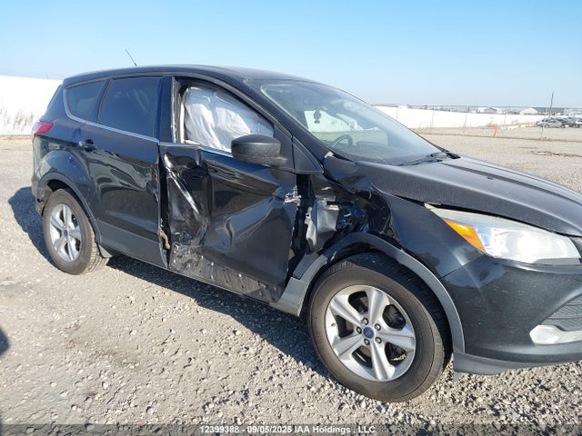 1FMCU9G93EUE02813 Ford 2014
