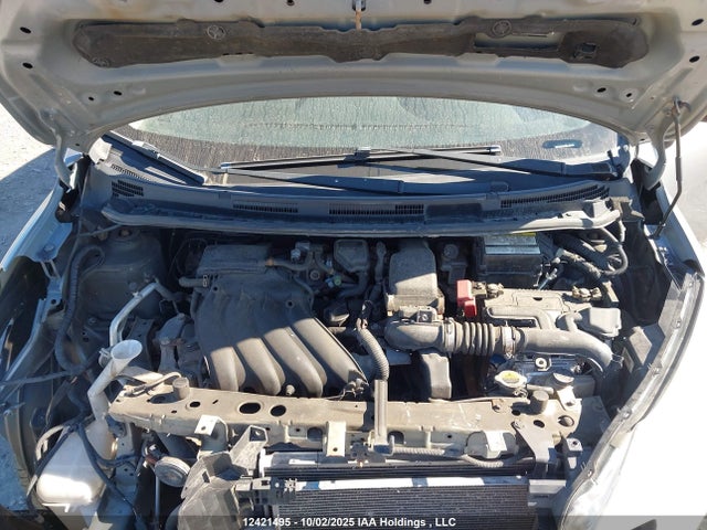 3N1CE2CP5EL402984 Nissan 2014