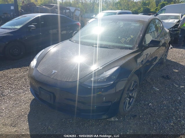 12424253 :رقم المزاد ، 5YJ3E1EA1NF258168 vin ، 2022 Tesla Model 3 مزاد بيع