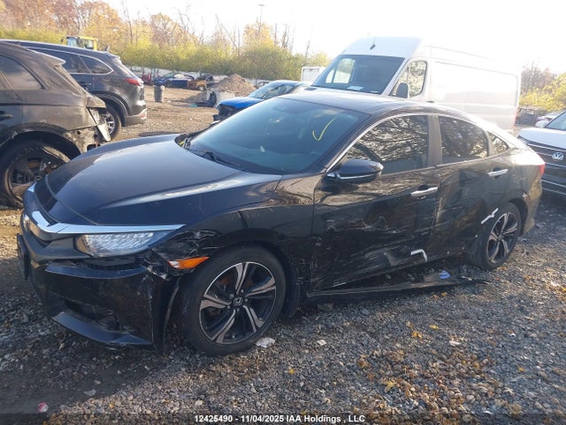 Продажа на аукционе авто 2018 Honda Civic Touring, vin: 2HGFC1F96JH101331, номер лота: 12425490
