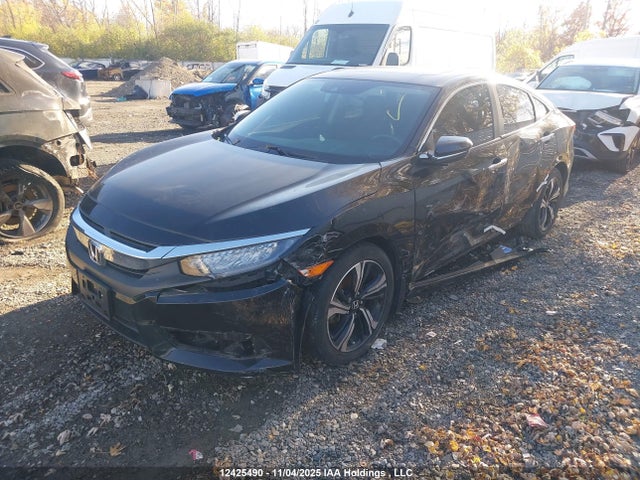 Продажа на аукционе авто 2018 Honda Civic Touring, vin: 2HGFC1F96JH101331, номер лота: 12425490