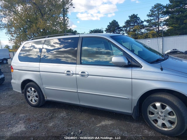 2003 Honda Odyssey Exl მანქანა იყიდება აუქციონზე, vin: 2HKRL18913H013242, აუქციონის ნომერი: 12434931