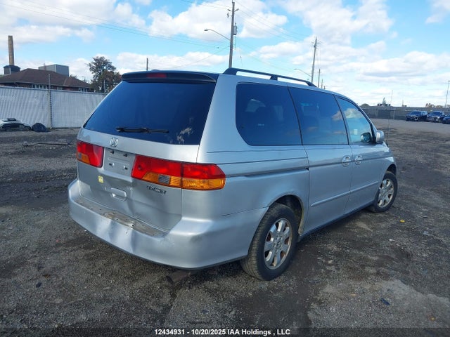 2003 Honda Odyssey Exl მანქანა იყიდება აუქციონზე, vin: 2HKRL18913H013242, აუქციონის ნომერი: 12434931