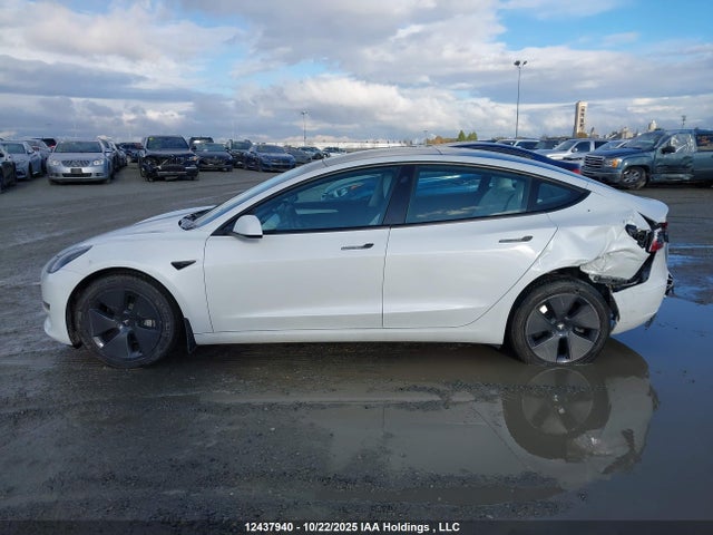 5YJ3E1EA0PF438809 Tesla Model 3 Rwd
