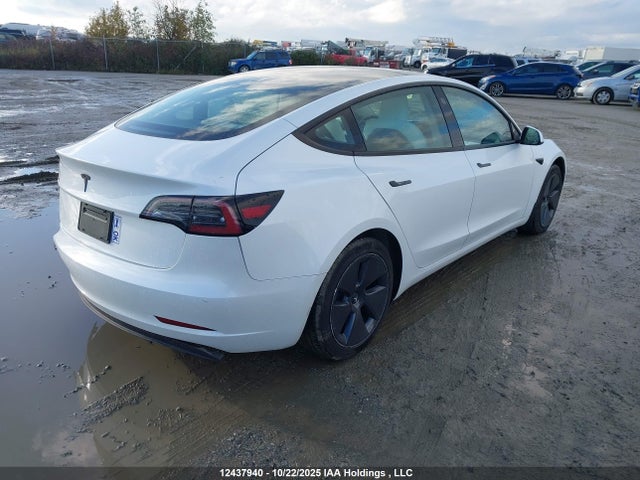 5YJ3E1EA0PF438809 Tesla Model 3 Rwd