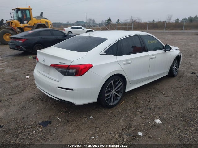 Продажа на аукционе авто 2022 Honda Civic Touring, vin: 2HGFE1F97NH001285, номер лота: 12440167