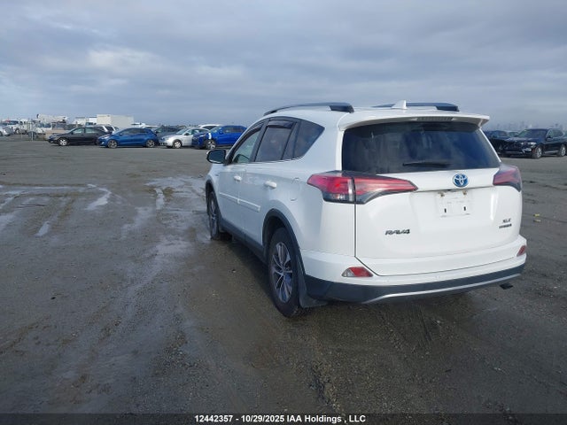 JTMRJREV7JD174493 Toyota Rav4 Hybrid Le+