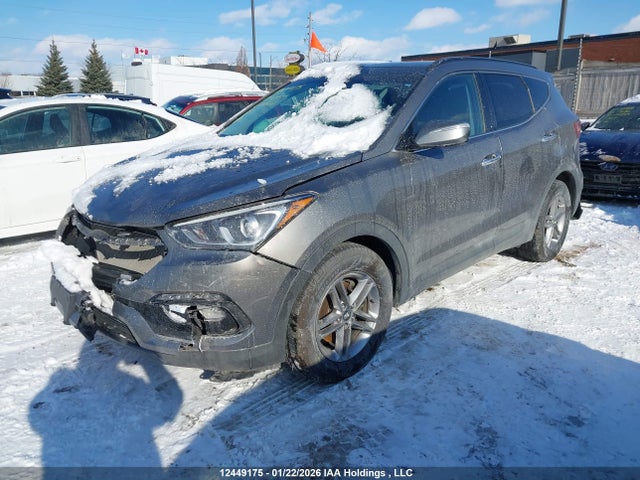 12449175 :رقم المزاد ، 5NMZUDLB2HH045601 vin ، 2017 Hyundai Santa Fe Sport 2.4 Se مزاد بيع