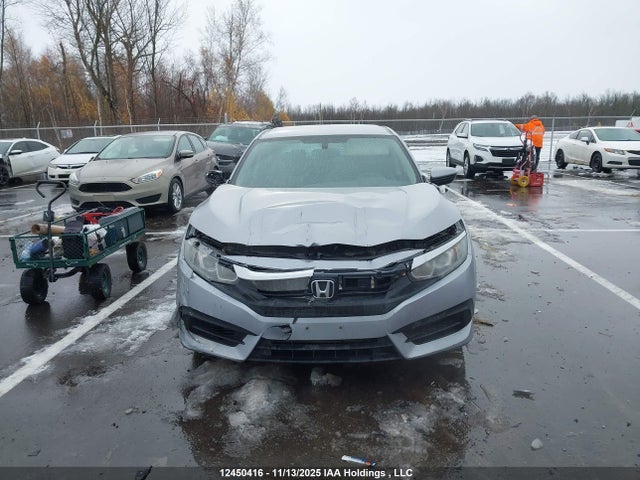 12450416 :رقم المزاد ، 2HGFC2F52HH037835 vin ، 2017 Honda Civic Lx مزاد بيع