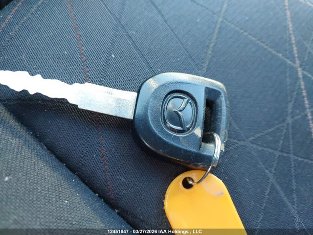 12451847 :رقم المزاد ، JM1DE1KY6C0149822 vin ، 2012 Mazda Mazda2 Gx مزاد بيع
