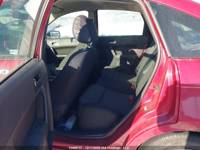 12459737 :رقم المزاد ، 1FAHP35NX9W104130 vin ، 2009 Ford Focus مزاد بيع