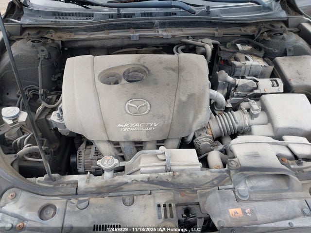JM1BM1K78E1176602 Mazda Mazda3 Gx-sky