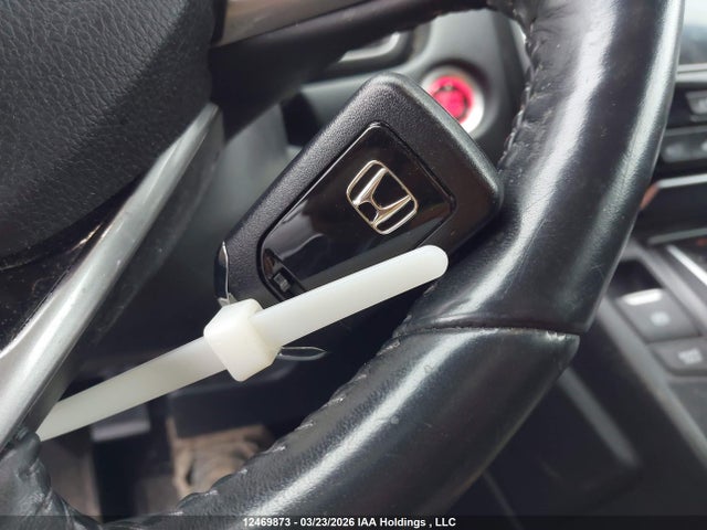 12469873 :رقم المزاد ، 2HKRW2H93LH200057 vin ، 2020 Honda Cr-v مزاد بيع
