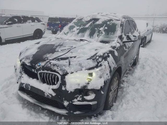 WBXHT3C57K3H36556 BMW X1 Xdrive28i