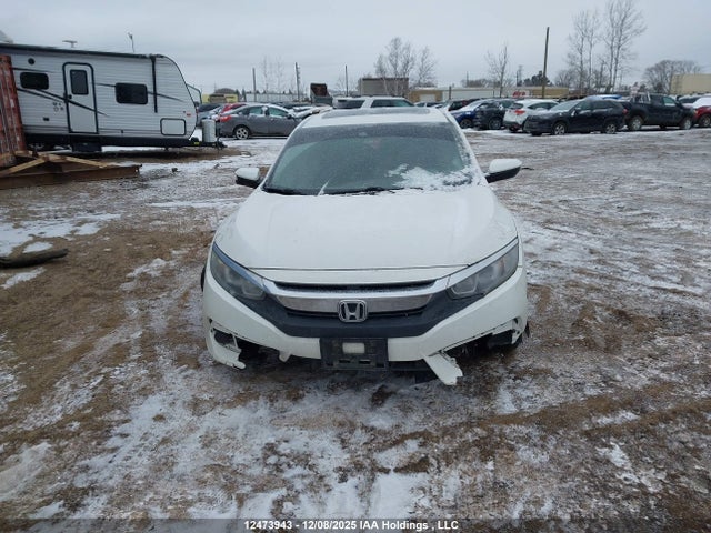 12473943 :رقم المزاد ، 2HGFC2F88JH001017 vin ، 2018 Honda Civic Ex 4dr مزاد بيع