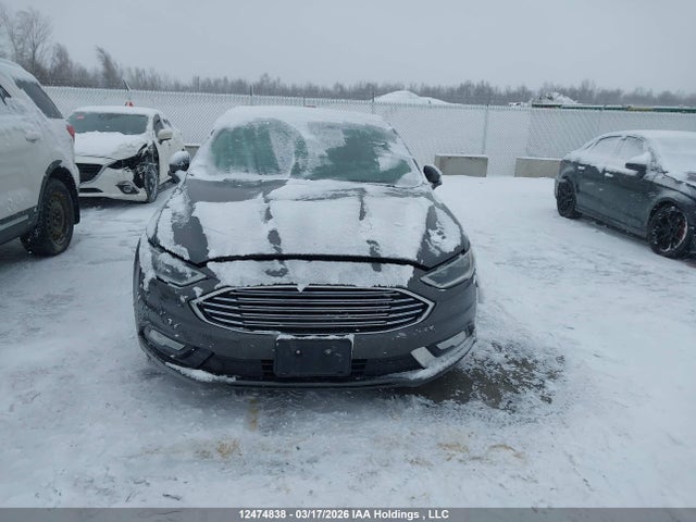 12474838 :رقم المزاد ، 3FA6P0D90HR202384 vin ، 2017 Ford Fusion Titanium مزاد بيع