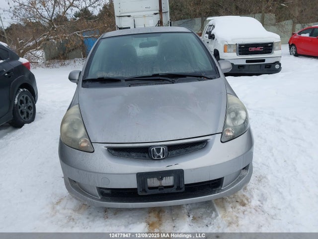12477947 :رقم المزاد ، JHMGD38437S818833 vin ، 2007 Honda Fit مزاد بيع