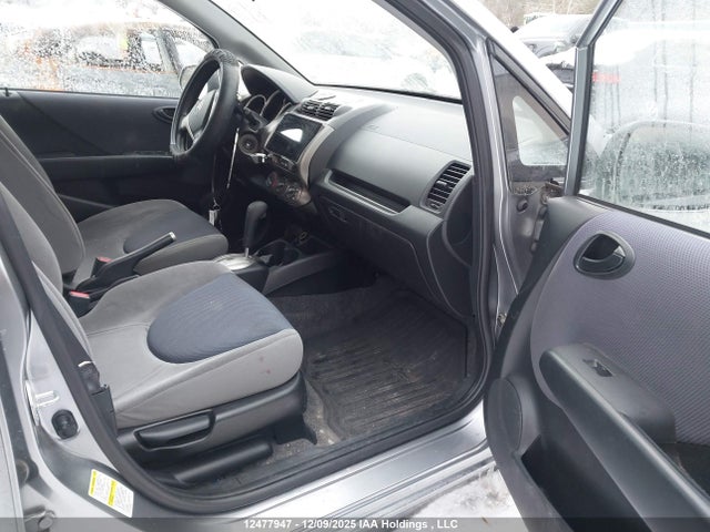 12477947 :رقم المزاد ، JHMGD38437S818833 vin ، 2007 Honda Fit مزاد بيع