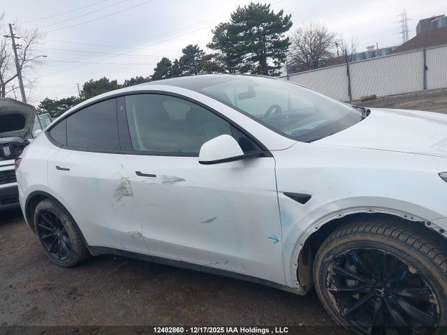 12482860 :رقم المزاد ، 7SAYGAEE7PF760465 vin ، 2023 Tesla Model Y Long Range مزاد بيع