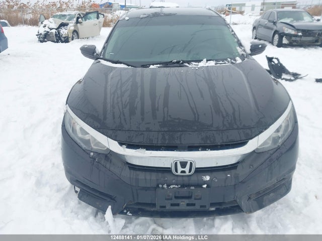 12488141 :رقم المزاد ، 2HGFC2F59JH040947 vin ، 2018 Honda Civic Lx مزاد بيع