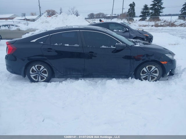 12488141 :رقم المزاد ، 2HGFC2F59JH040947 vin ، 2018 Honda Civic Lx مزاد بيع