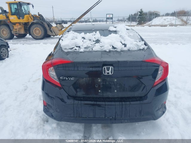12488141 :رقم المزاد ، 2HGFC2F59JH040947 vin ، 2018 Honda Civic Lx مزاد بيع