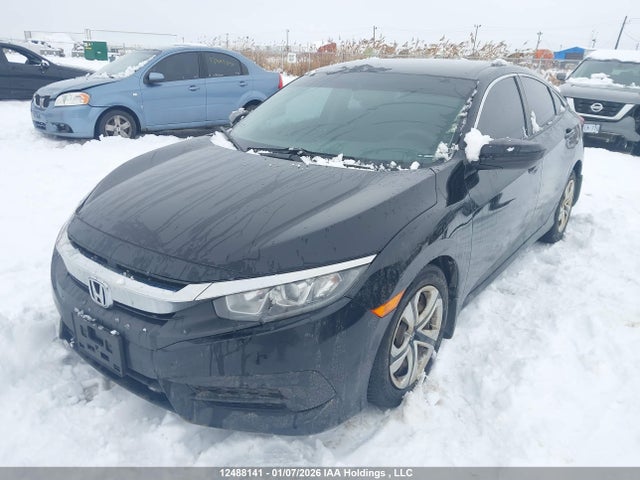 12488141 :رقم المزاد ، 2HGFC2F59JH040947 vin ، 2018 Honda Civic Lx مزاد بيع
