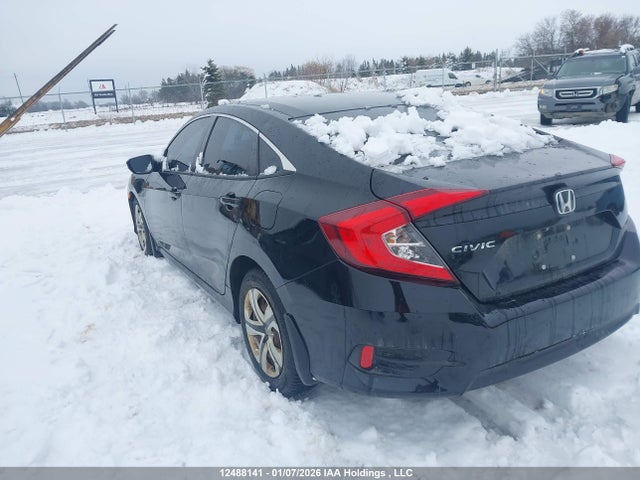 12488141 :رقم المزاد ، 2HGFC2F59JH040947 vin ، 2018 Honda Civic Lx مزاد بيع