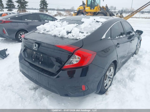 12488141 :رقم المزاد ، 2HGFC2F59JH040947 vin ، 2018 Honda Civic Lx مزاد بيع