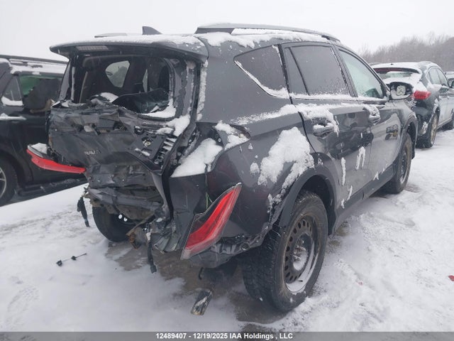 2T3ZFREV9JW496704 Toyota RAV4 LE