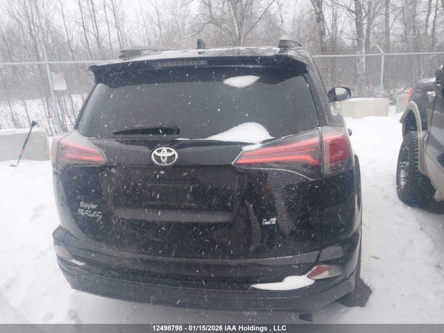 2T3ZFREV0JW487910 Toyota RAV4 LE