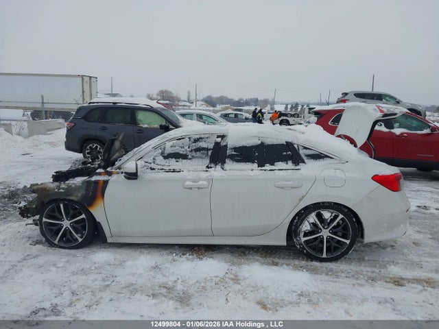Продажа на аукционе авто 2022 Honda Civic Touring, vin: 2HGFE1F95NH006064, номер лота: 12499804