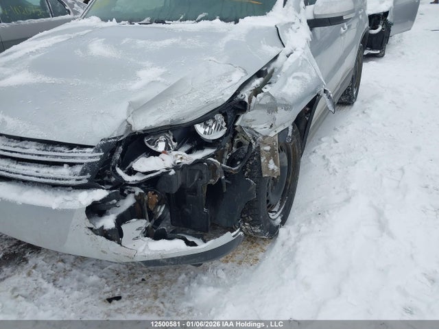 WVGMV7AX2HK039711 Volkswagen Tiguan