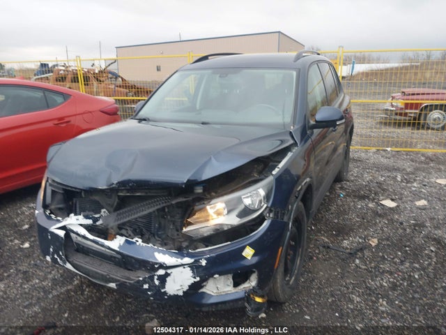 WVGJV7AX4GW022970 Volkswagen Tiguan