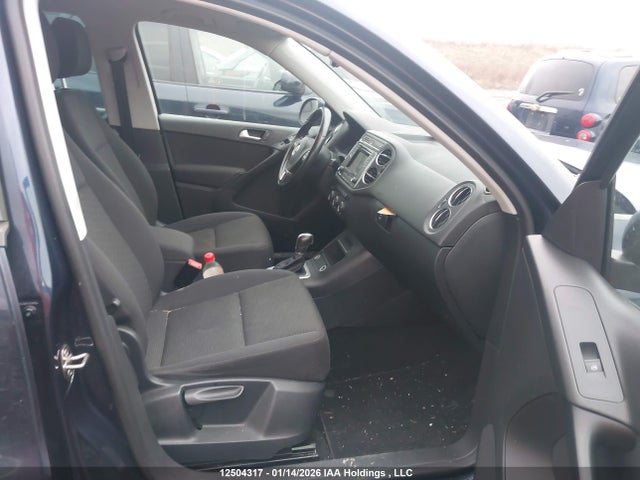 WVGJV7AX4GW022970 Volkswagen Tiguan