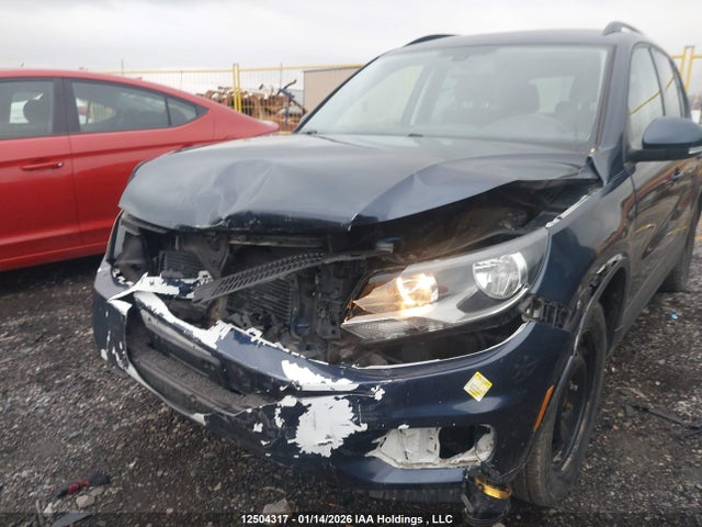 WVGJV7AX4GW022970 Volkswagen Tiguan