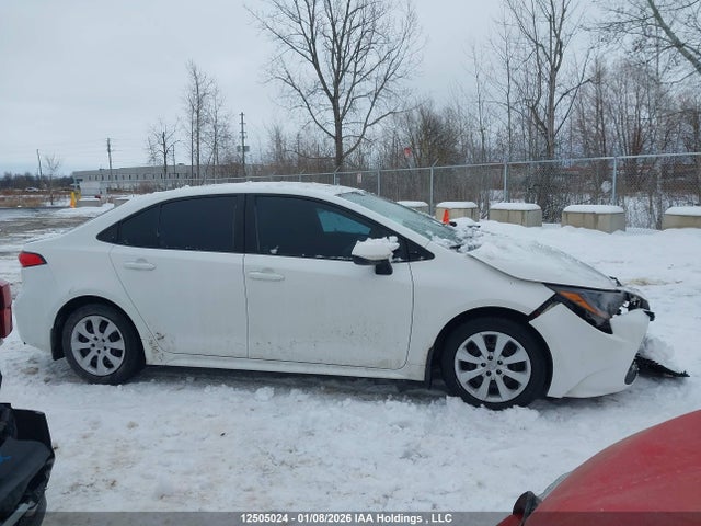 12505024 :رقم المزاد ، 5YFBPMBE0MP151372 vin ، 2021 Toyota Corolla Le مزاد بيع