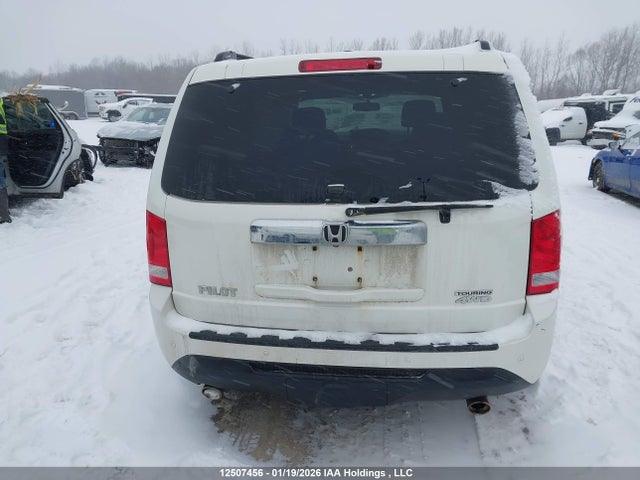 Продаж на аукціоні авто 2015 Honda Pilot Touring, vin: 5FNYF4H99FB506156, номер лоту: 12507456