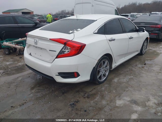 Honda Civic Touring 2016 2HGFC1F97GH114419 Image 4