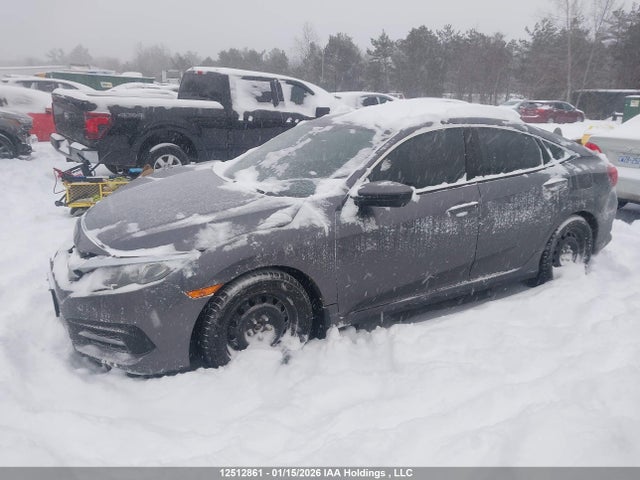 2HGFC2E5XJH003813 Honda Civic Lx