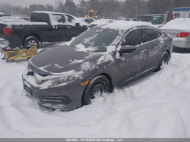 2HGFC2E5XJH003813 Honda Civic Lx
