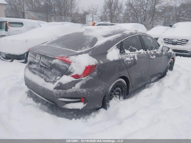 2HGFC2E5XJH003813 Honda Civic Lx